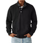 Men's black long sleeve sweatshirt with button detail on collar worn with light blue jeans