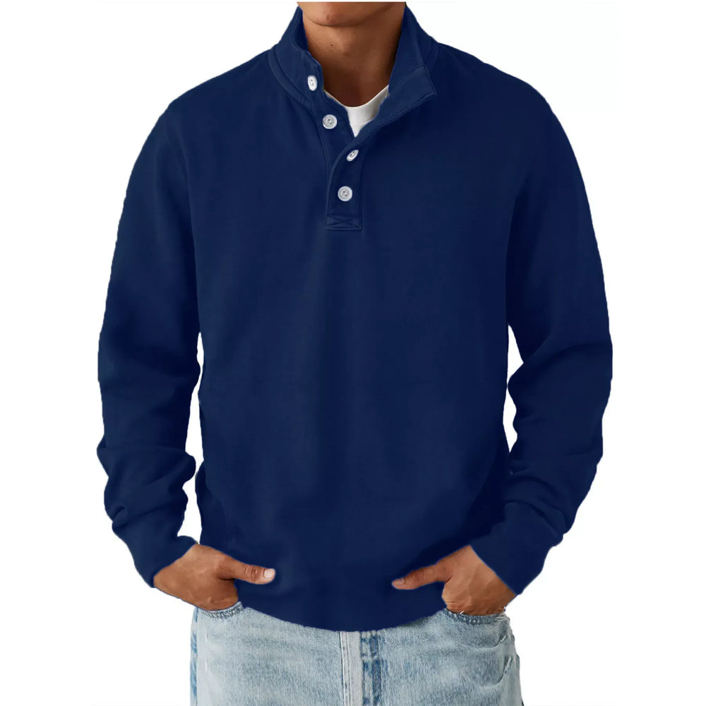 navy blue men's long sleeve sweatshirt with button detail, worn with light wash jeans